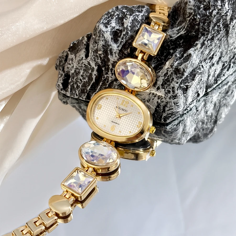 Ladies Watch: Smooth Pebble Case Colorful Gem-Set Band Elegant Brilliant Statement Watch