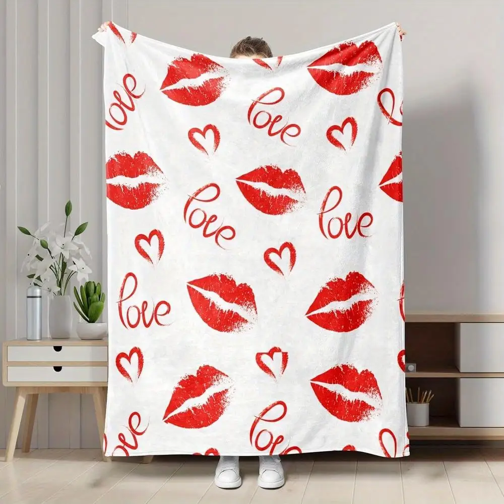 This heart and lip patterned blanket is made of polyester, is machine washable, and suitable for use on sofas and beds.