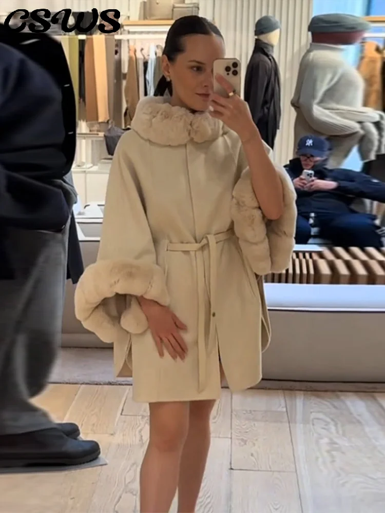 

Элегантные меховые лоскутные пальто миди женские утепленные на пуговицах с воротником-стойкой шикарные пальто женские 2026 модная свободная верхняя одежда с поясом