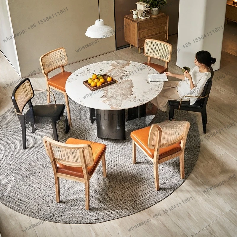 Italian minimalist light luxury round rock slab dining table rattan solid wood dining chair back chair