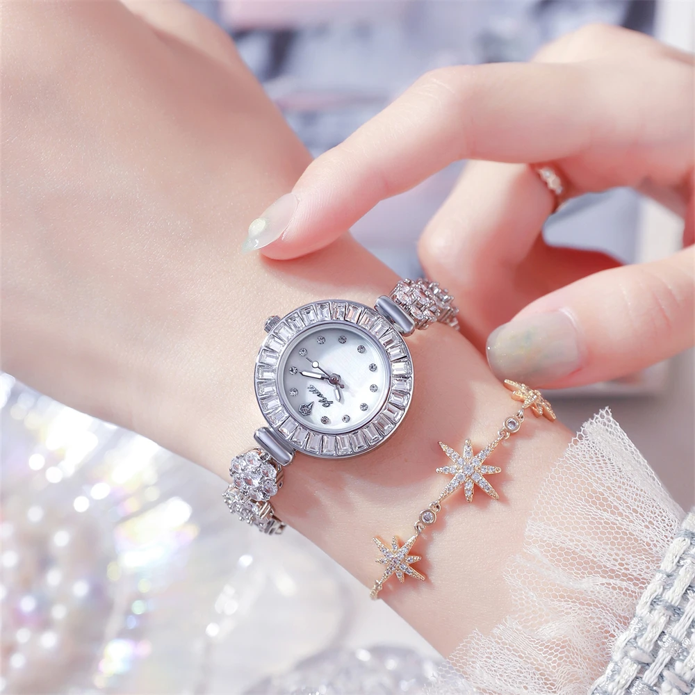 Personalized temperament women watch round diamond zircon four flower jade butterfly pearl silver strap night light quartz watch