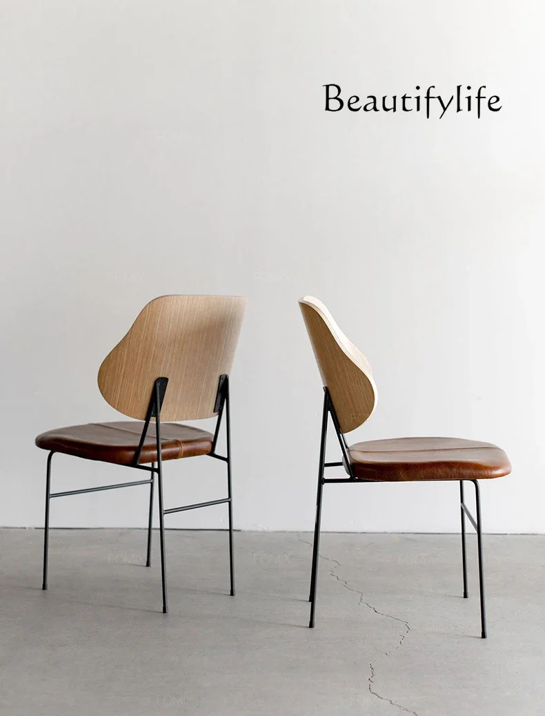 

sillas para salón Italian minimalist dining chair backrest home leather cowhide dining room chair modern minimalist Nordic wabi