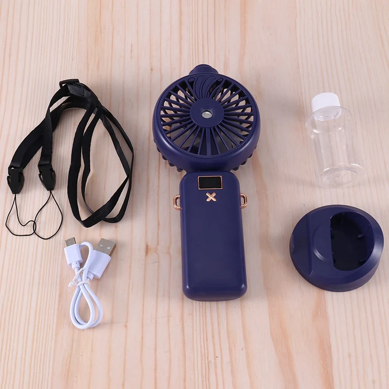 Vendita superiore 5000Mah Ventilatore elettrico pieghevole USB ricaricabile Ventola di raffreddamento ad aria Funzione spray Ventilatore portatile con display digitale a 5 velocità