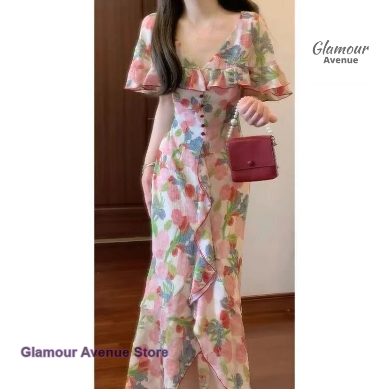 

French romantic and elegant retro ruffled cloak collar floral dress female summer new fashion waist slim temperament dress.