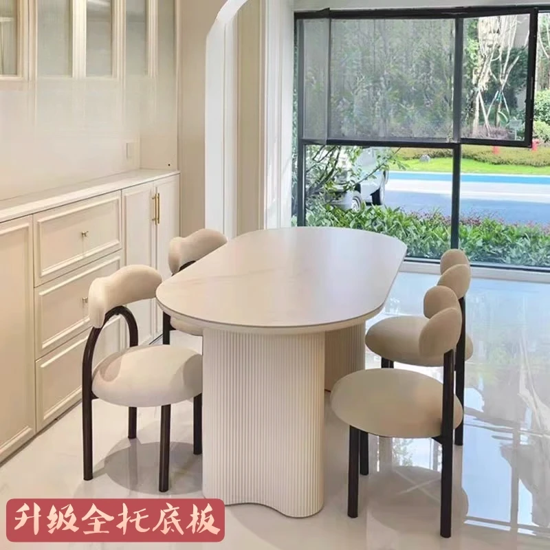 

French slate oval dining table small apartment Nordic cream style dining table and chair combination High Quality