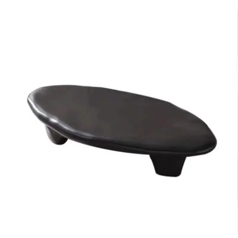 

Creative cobblestone shape coffee table black wabi style designer small apartment living room modern minimalist special shape