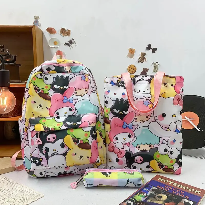 

Sanrio Kuromi Hello Kitty My Melody Cinnamoroll Cartoon Cute Large Capacity School Bag Handbag Stationery Bag Three-piece Set