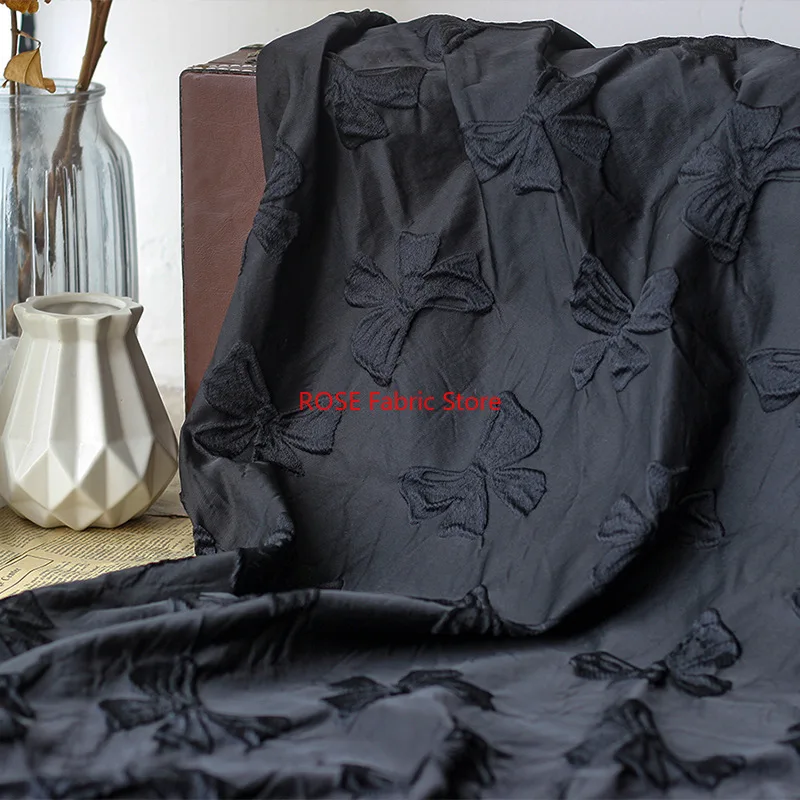 1 Meter Yarn Dyed Embossed Black Bow Jacquard Fabric Stiff Polyester Autumn and Winter Jacquard Dress Fabric