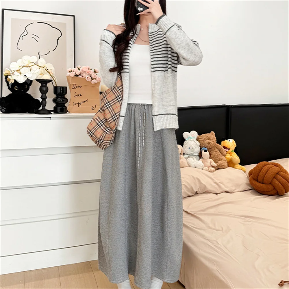 تنورة طويلة برباط عالية الخصر لربيع 2025 للسيدات للخريف والشتاء تنانير متوسطة الطول دافئة للسيدات تنورة ماكسي كورية بلون واحد #5