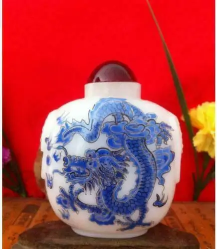 

Chinese old antique glazed blue dragon and phoenix snuff bottle