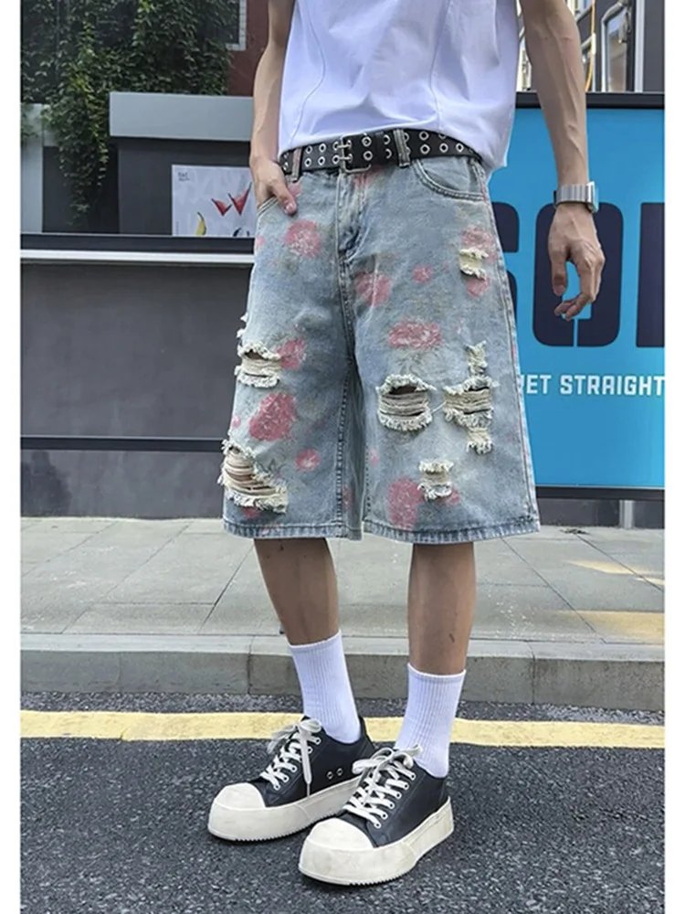 

Flower hole denim shorts men's summer niche design pants American high street Vibe casual five quarter pants
