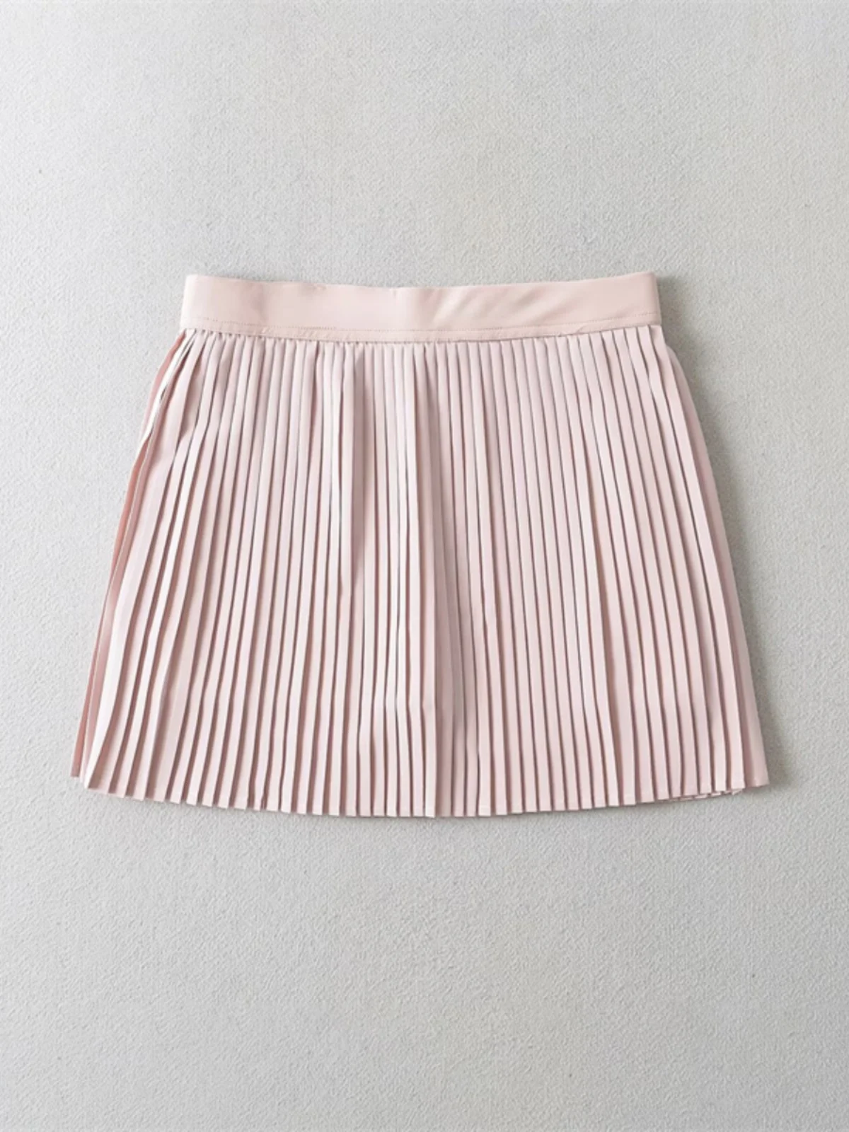 Zoete en pittige Street Sle-tennisrok met accordeonplooien Anti-lichte rok Elastische taille Afslankend ontwerp voor meisjes