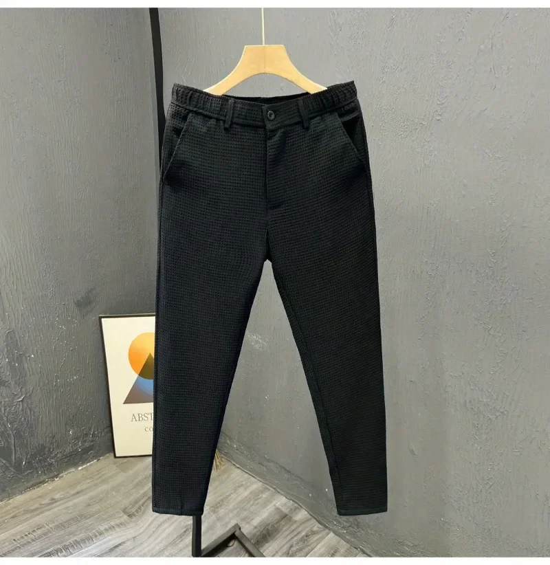 2025 Tendenza per il tempo libero Edizione coreana Estate Tinta unita Tasca con cerniera Vita alta da uomo Elastico Slim Fit Dritto Nove pantaloni divisi