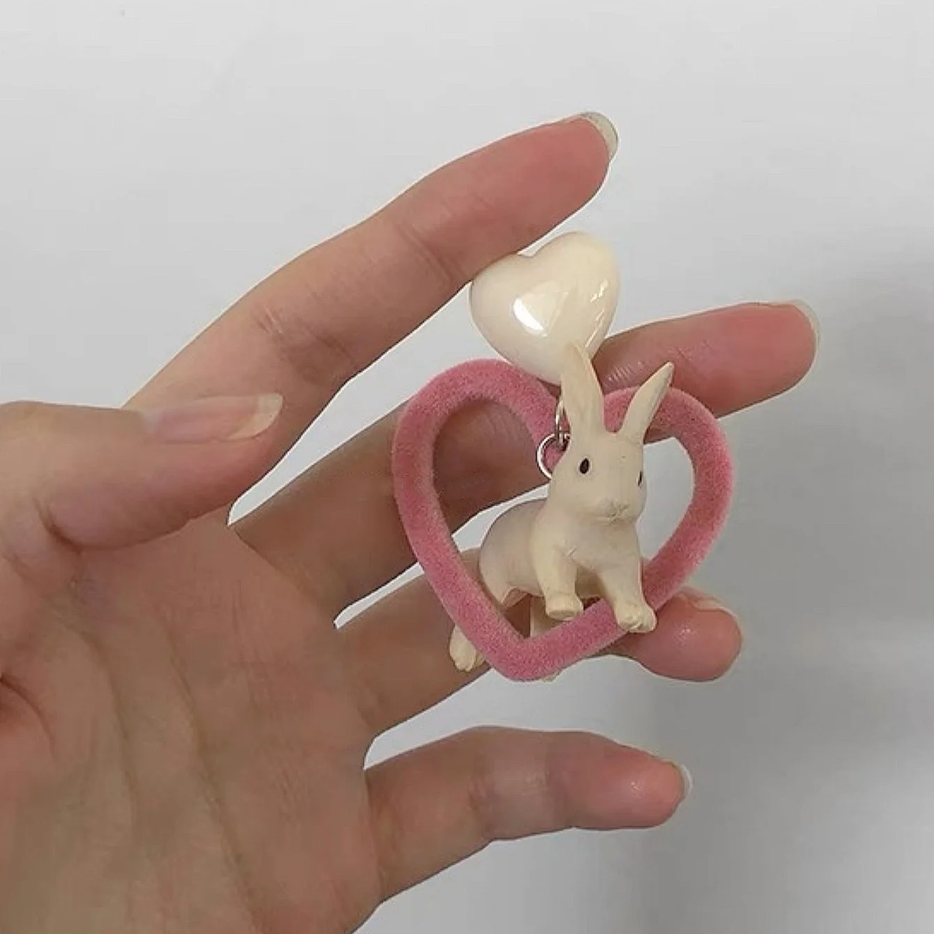 A Pair of Simple Cartoon Cute Sweet Velvet Hollow Love Three-dimensional Rabbit Personality Earrings