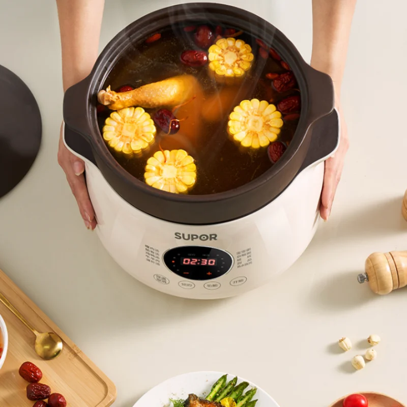 وعاء الطبخ الكهربائية 5L المنزلية سعة كبيرة التلقائي وعاء الطبخ كونجي الأرجواني السيراميك خزفي Stewing كوب الذكاء