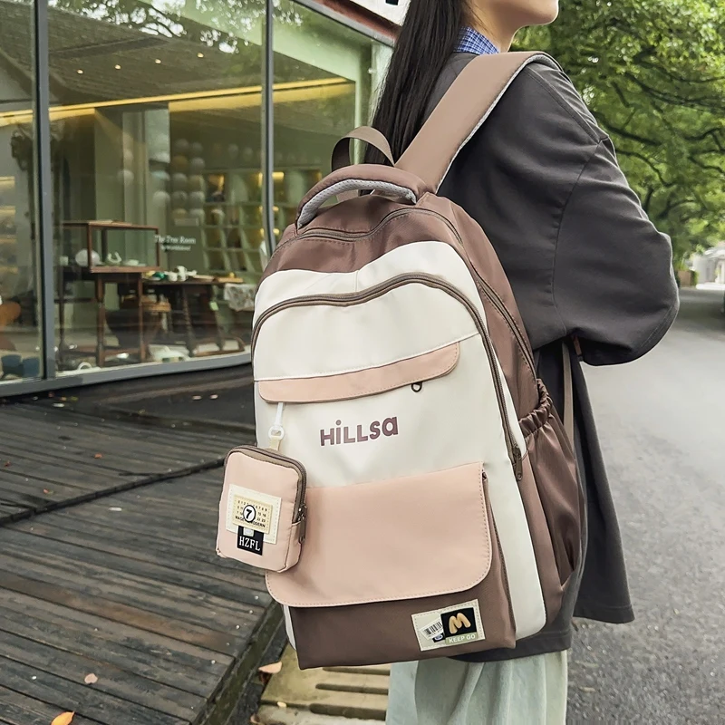 

Simple yet Practical Nylon School Backpack Lightweight for Everyday School Use Suitable for Both Boys and Girls