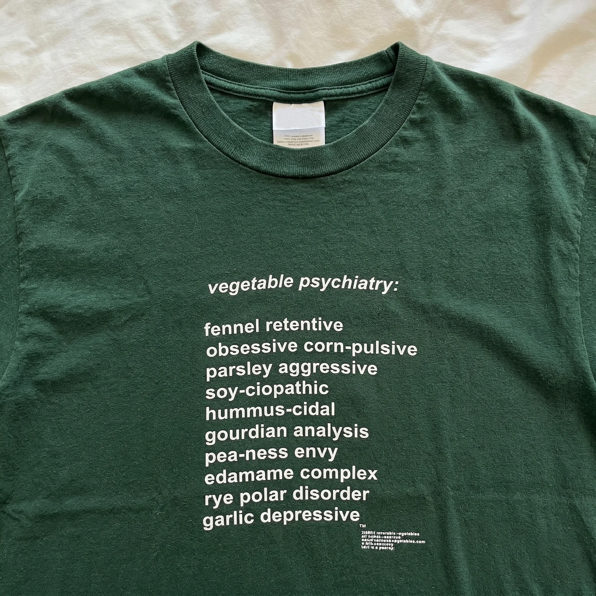 Loose Fit Summer Short Sleeve T-Shirt in Olive Green Color with White Enhancing Minimalist English Paragraph Design Sensation
