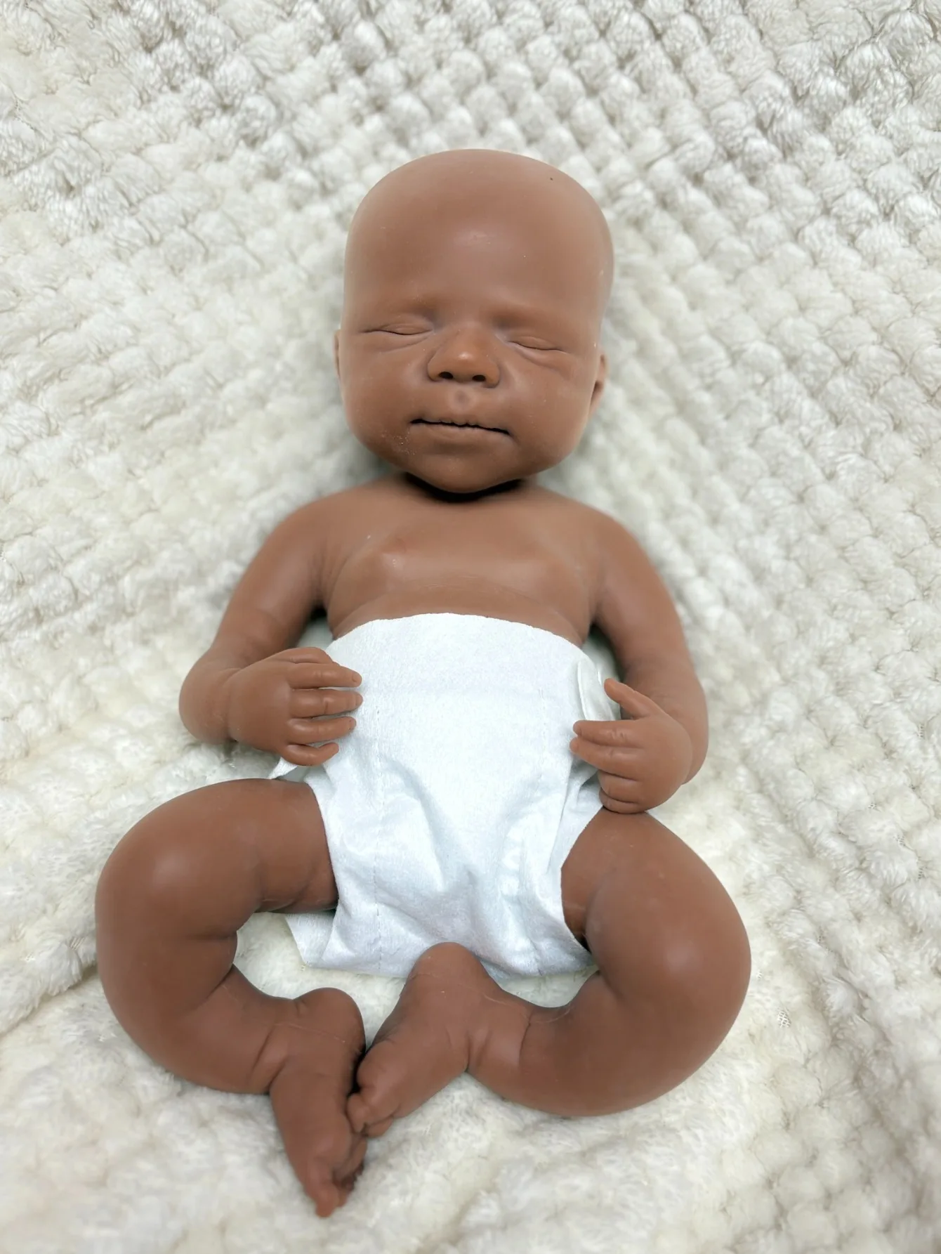 

New 13 inch full body silicone pasclae girl Dark skin cute soft reborn doll, with bald head can give children as a gift.