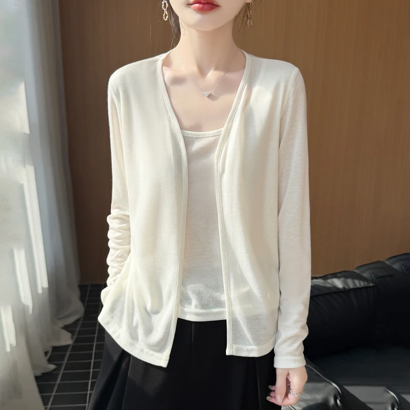 

Spring/Summer New Knitted Wool V-neck Knitted Cardigan Long Sleeve Women's Solid Color Loose Design Sensation Fake Two piece Top
