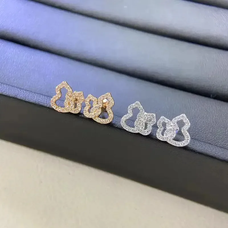 

ROBO S925 small-scale design high-end earrings simple temperament daily bell-shaped earrings double pumpkin mysterious earrings