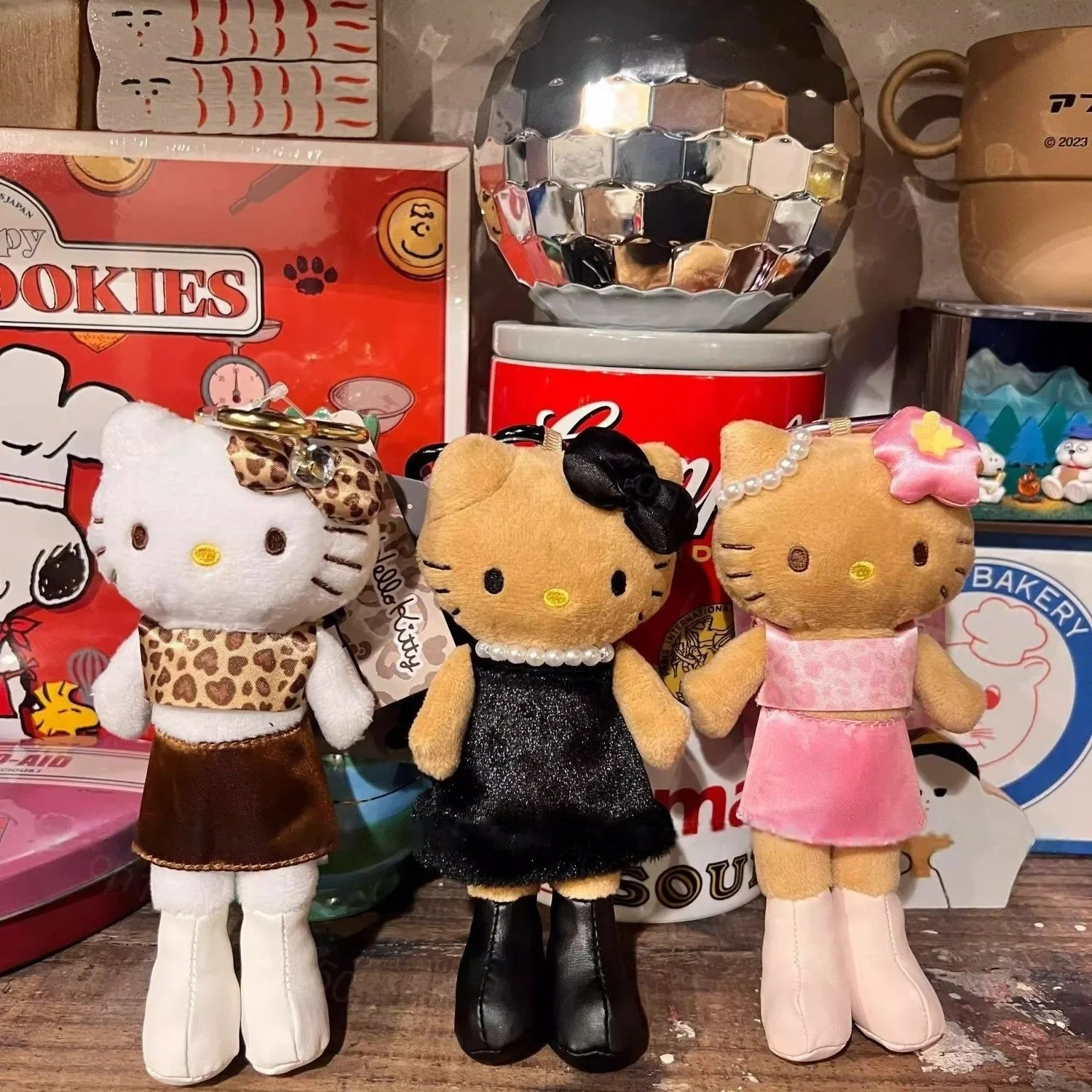 Hello Kitty longues jambes Socialite peluche porte-clés Sanrio KT chat peau noire imprimé léopard en peluche sac à dos sac pendentif femme cadeau