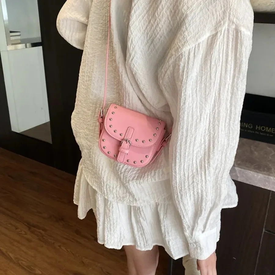 

Spring and summer new senior sense of fashion rivets niche single shoulder women's bag small square bag mini hundred saddle bags