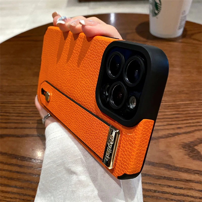 

Кожаный текстурированный чехол с ремешком на запястье для Iphone 17, 16, 15, 11, 12, 13, 14 Pro Max Air X S Plus, мягкий силиконовый кронштейн, чехол Funda