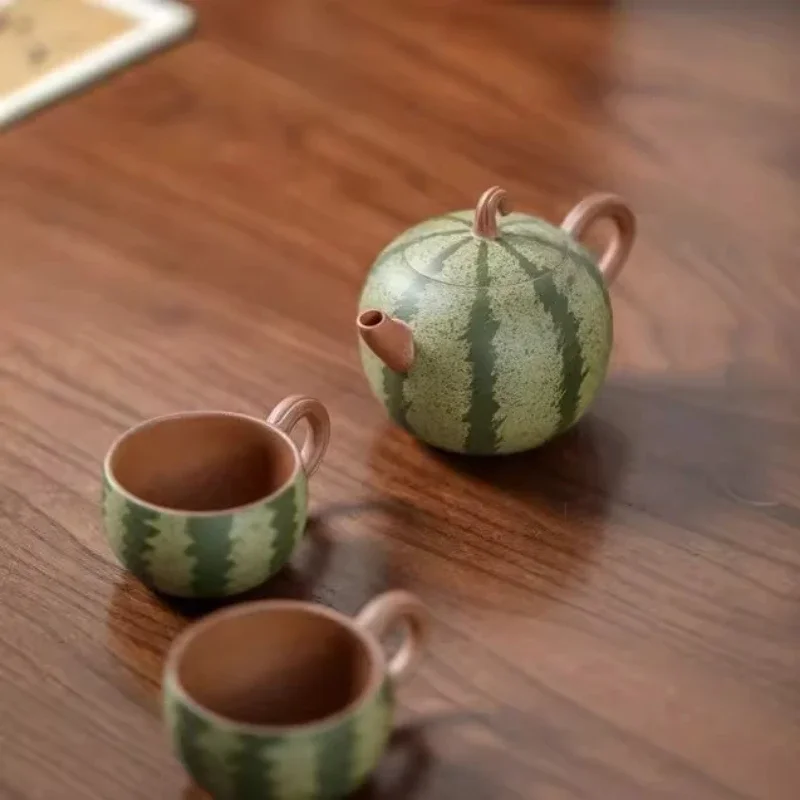 Zisha pot bionic watermelon set, one pot and two cups, all handmade 200c famous high-end Zisha pot