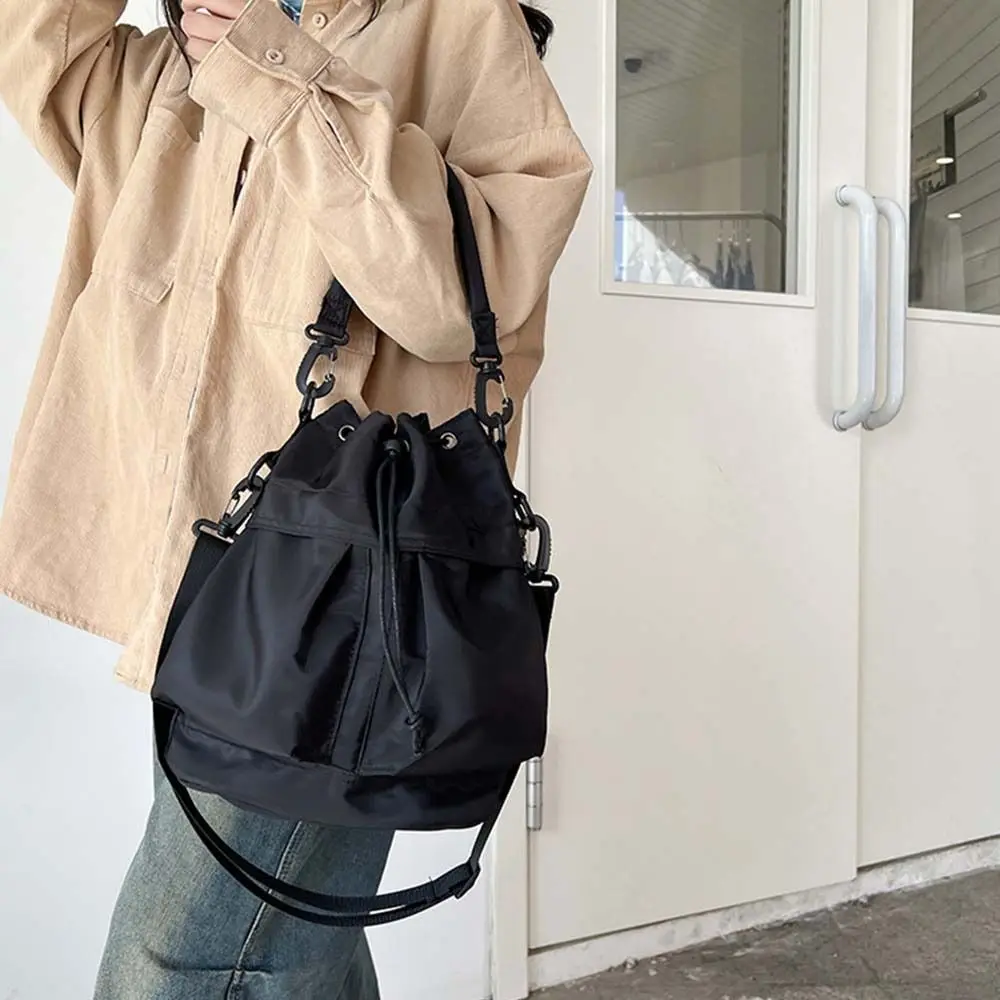 

Korean Style Swimming Nylon Crossbody Bag Solid Color Nylon Drawstring Fitness Bag Niche Design Large Capacity Bucket Bag Travel