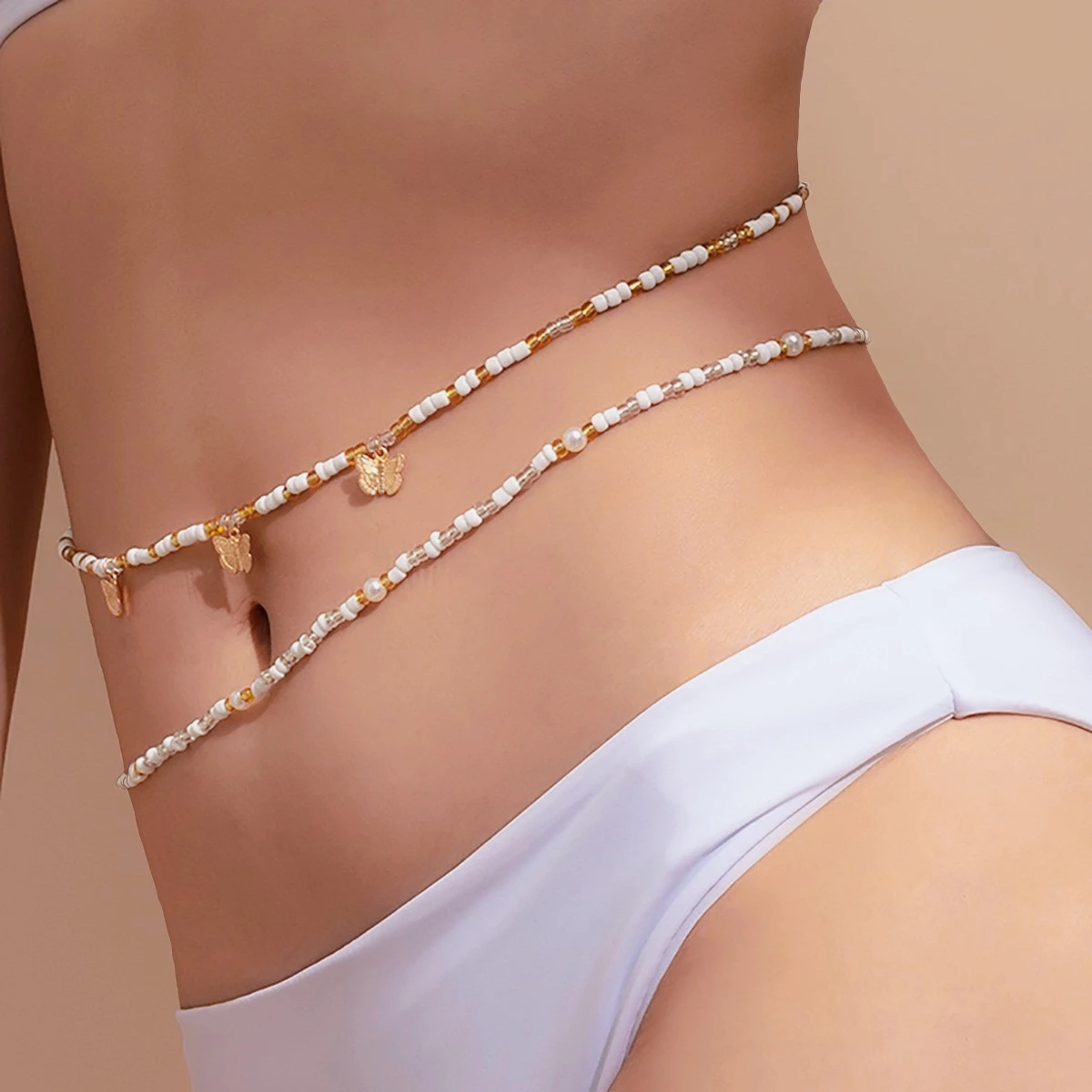 Off-white Rice Beads Butterfly Tassel Fine Belly Chain Waist Women's Body Chain 2026 Trend Party Sexy Elastic Bead String Jewelr