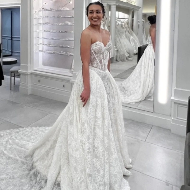 

Customized 2026 Wedding Dress Strapless Lace Fabric Tight Corset With Large Skirt Trailing Exquisite And Romantic Wedding