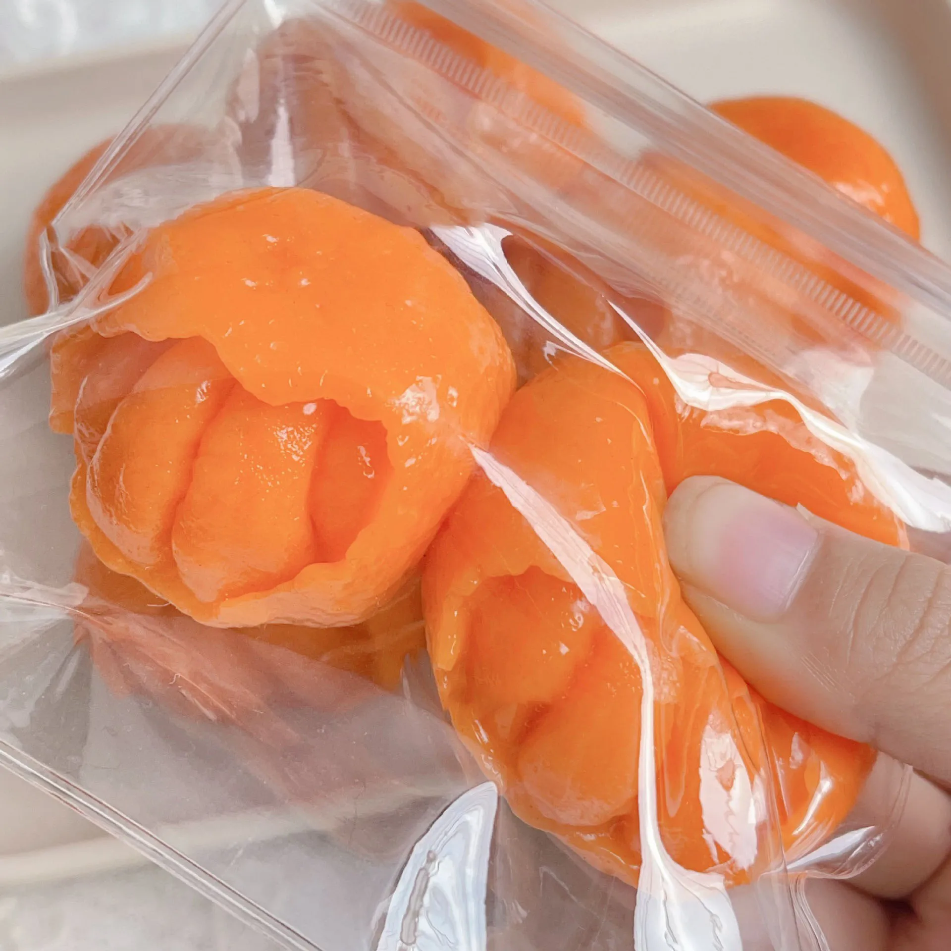 2024 Mochi Taba SquishyNEW novedad divertido medio pelado naranja pellizco juguetes inquietos pulpa de fruta simulada juguetes difíciles para niños