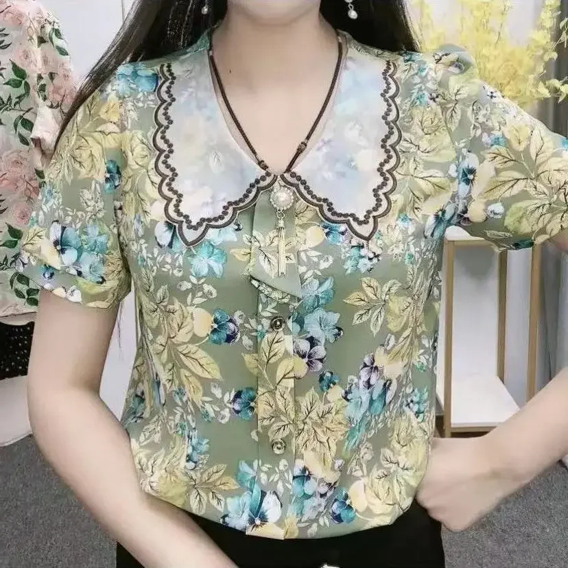 

2025 summer new small floral chiffon shirt women's summer design top doll collar short-sleeved flower shirt