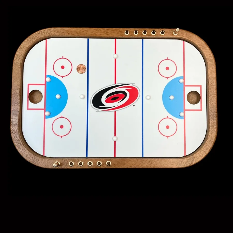 Juego de hockey Penny Hurricanes de Carolina