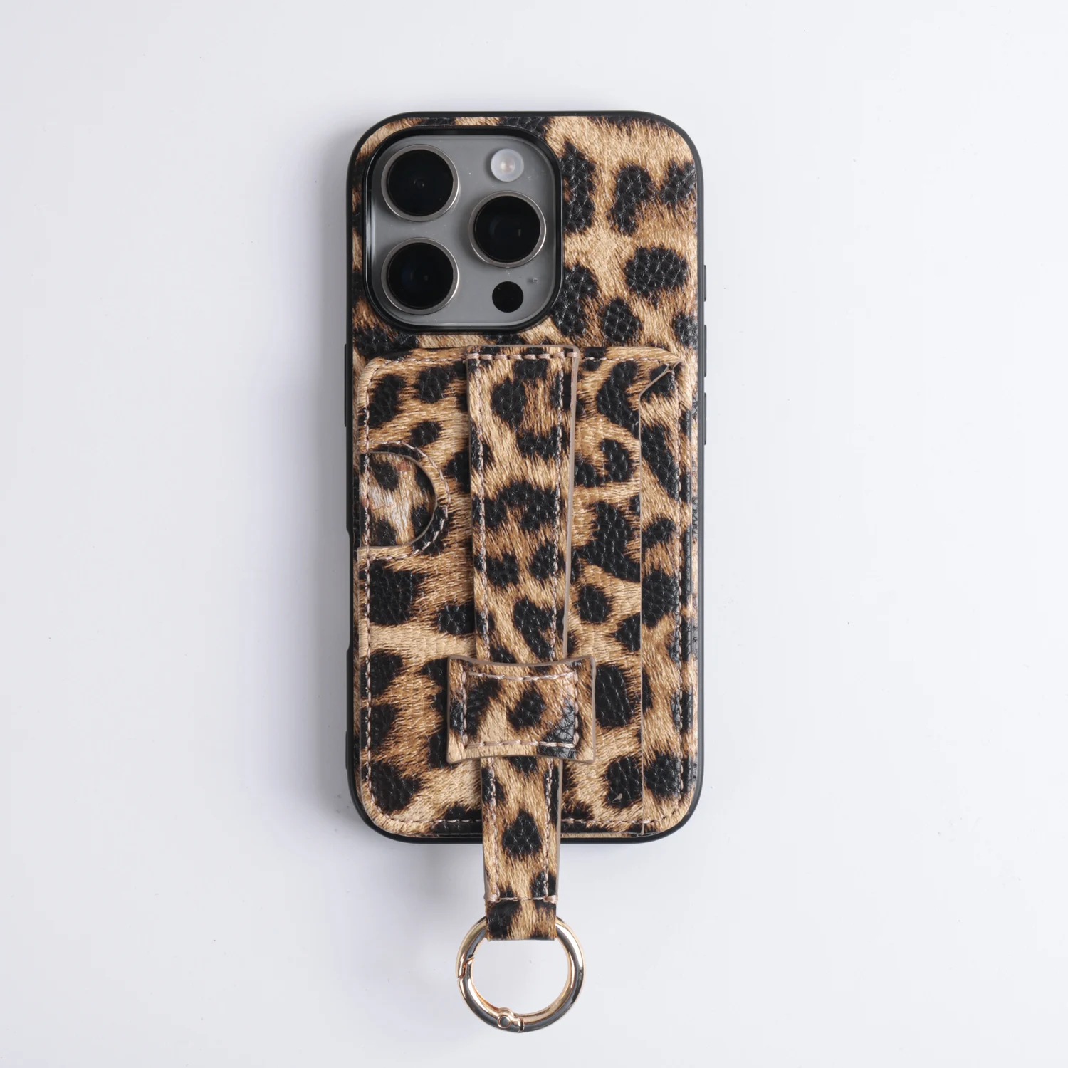 Leopardenmuster Strukturiertes PU-Leder Handyhülle für iPhone 17/16/15/14 Pro Max mit Kartenhalter, Fingerriemen und Schutzring