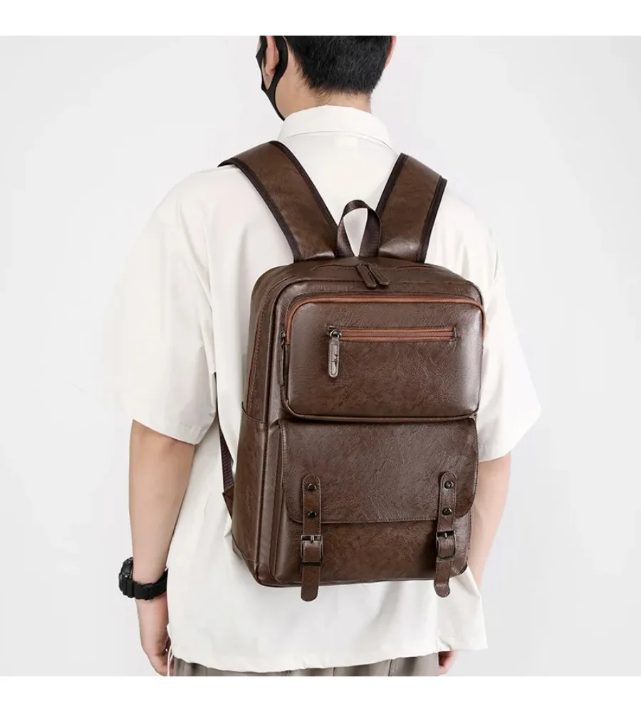 Polished faux leather backpack blends refined style with spacious storage for students and professionals