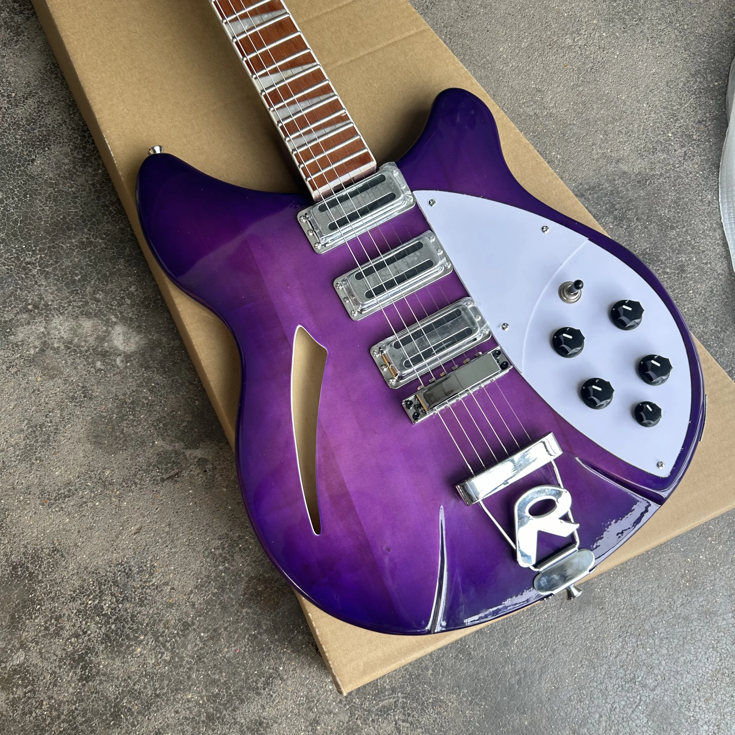 Nueva guitarra eléctrica morada 360, venta al por mayor y al por menor.