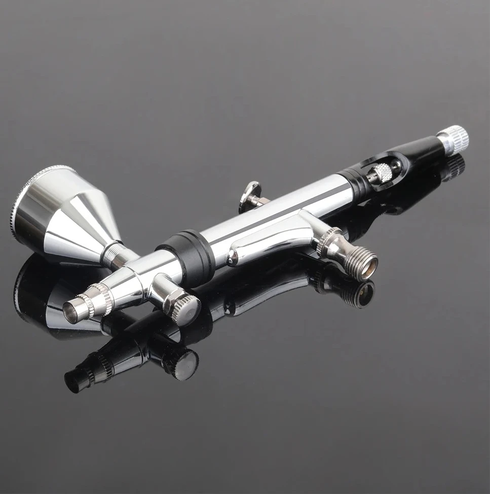 

Аэрограф двойного действия с вращающейся головкой, гравитационной подачей и возможностью использования с обеих сторон, совместим с большинством типов сифонного подключения.