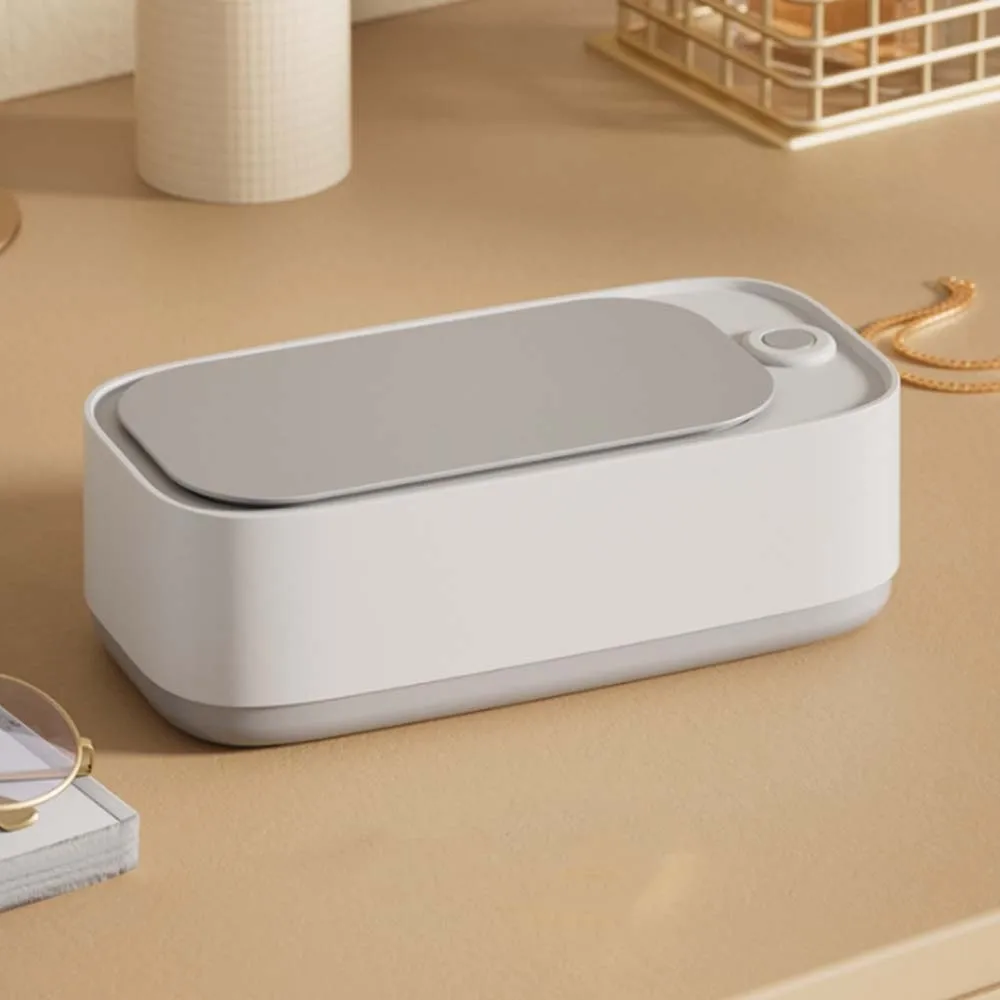 آلة تنظيف النظارات عالية التردد بزر واحد 360 °   آلة إزالة بقع المجوهرات المحمولة القابلة لإعادة الشحن