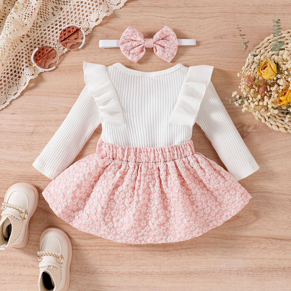 PatPat 3pcs Baby Girl Solid Cotton Ribbed Ruffle Trim Long-sleeve Romper and Floral Textured Bow Front Skirt & Headband Set