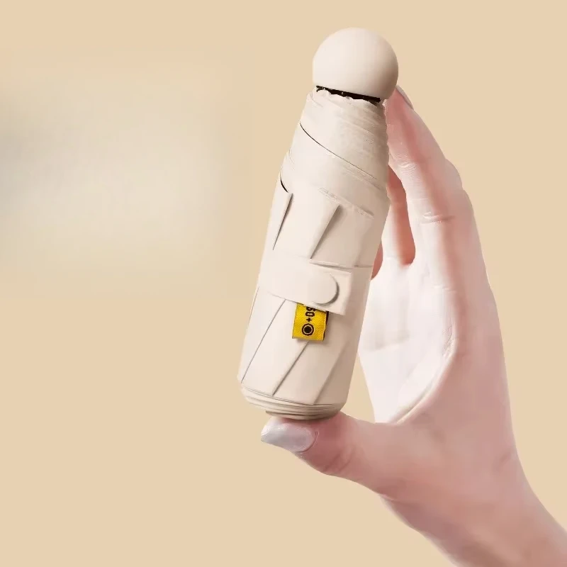 

Складной дорожный зонт с 6 ребрами, легкий компактный карманный зонт, ветрозащитный, непромокаемый, с капсульным хранилищем для повседневной жизни