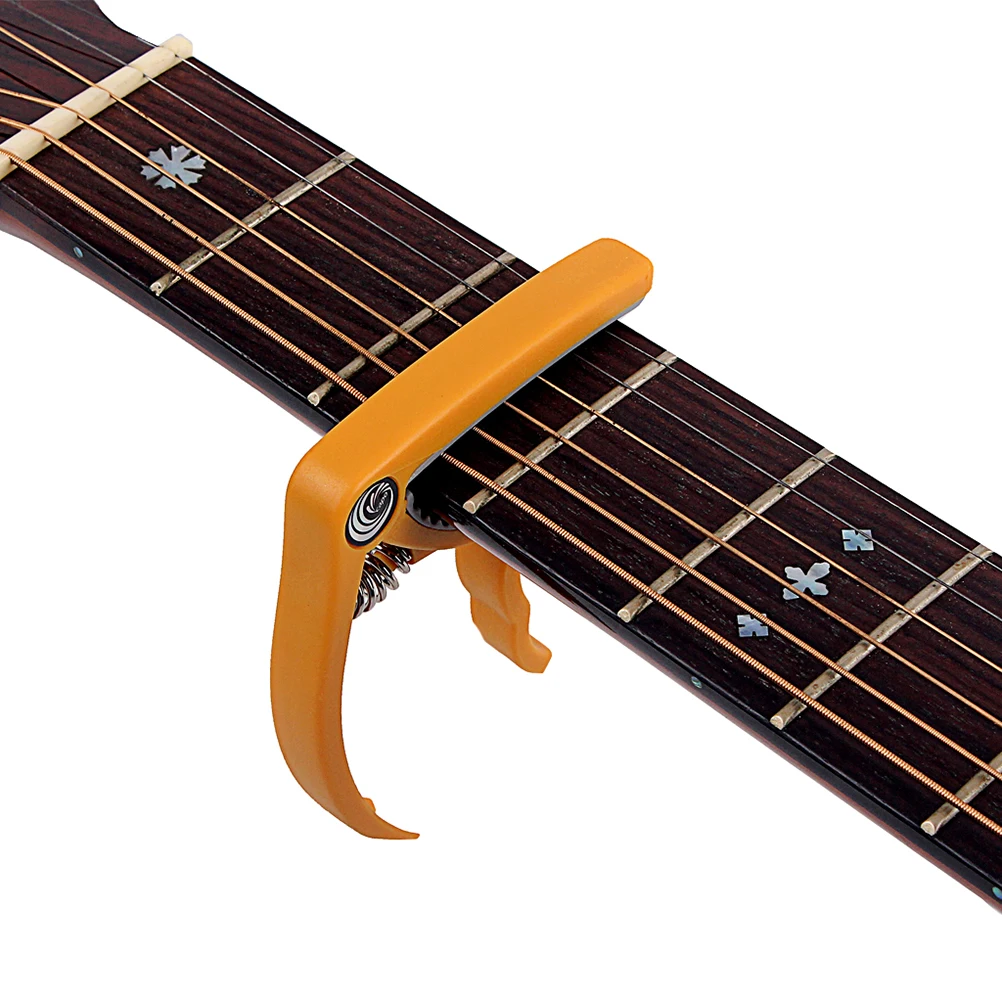 

Capo Guitar Picks Tune Clamp Key Trigger Capo Clip-on Tuner for Acoustic Electric Guitar Ukulele Banjo Mandolin (Orange)