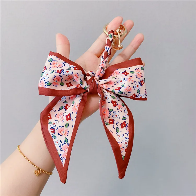 Keychains Creative scarves keychains bags pendants horseshoe buckles  car chains  ribbons bowknot accessories