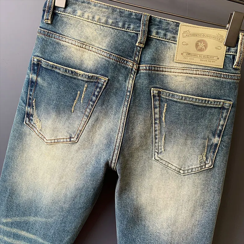 Włoski styl Moda Mężczyźni Dżinsy Wysokiej jakości Retro Sprany Niebieski Rozciągliwy Slim Fit Ripped Jeans Mężczyźni Vintage Designer Denim Pants