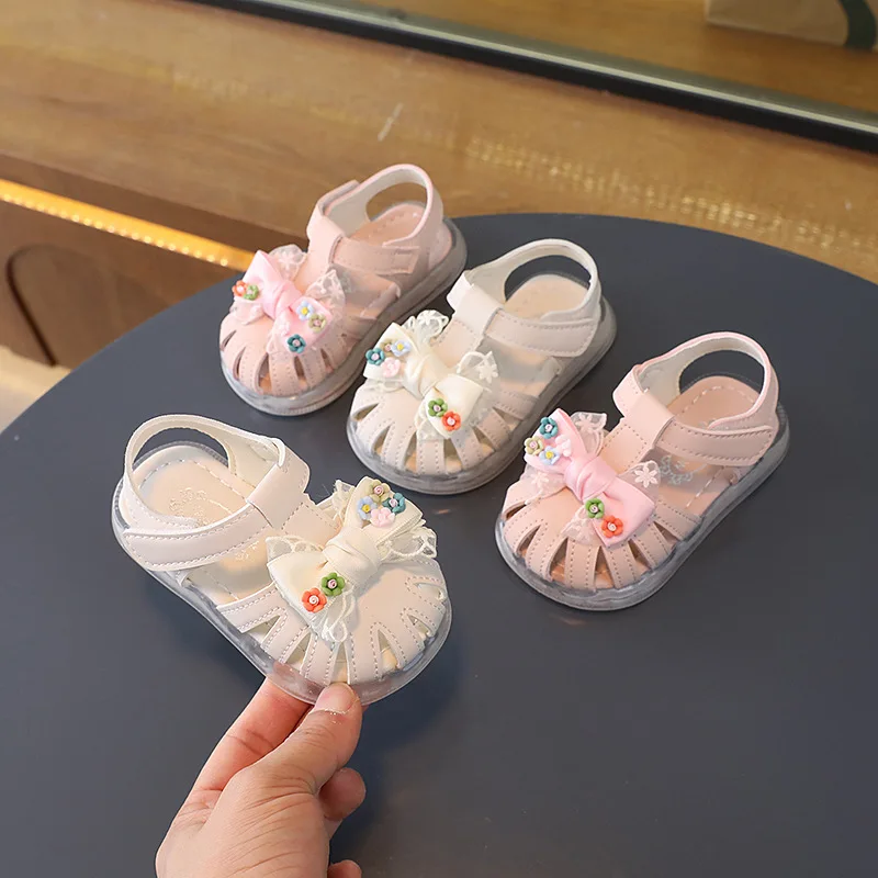 

2024 New Summer Baby Girl Sandals Fashion Cute Bowtie Flower Soft Sole Toddler Shoes Kids Hollow Out Princess Sandals 0-3 Years