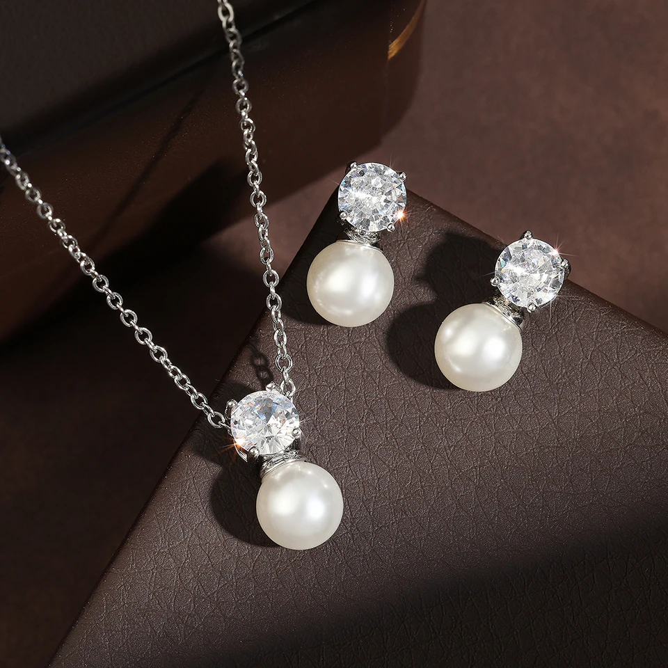 ZAKOL Trendy Round Simulated Pearl Stud Earrings Necklace Set for Women Simple Sliver Color Cubic Zircon Bridal Party Jewelry