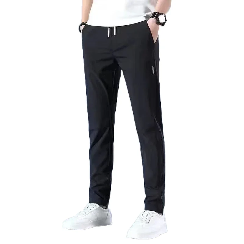 

Men's ice-silk trousers summer thin casual pants mint cold sense suit pants young breathable sagging trousers man