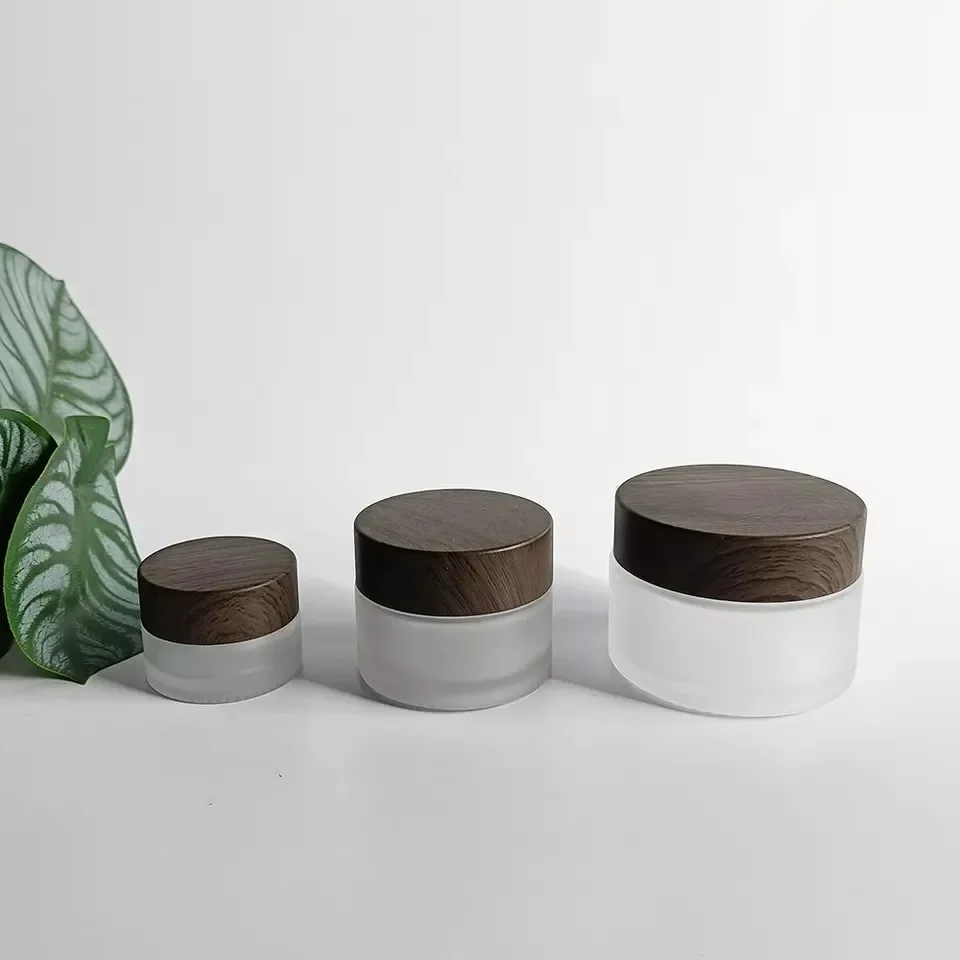 قناع كريم الوجه التجميلي، حاوية مستحضرات التجميل، برطمانات كريم بلوري، لوشن الجسم الزجاجي الشفاف غير اللامع مع أغطية خشبية داكنة بلاستيكية #2