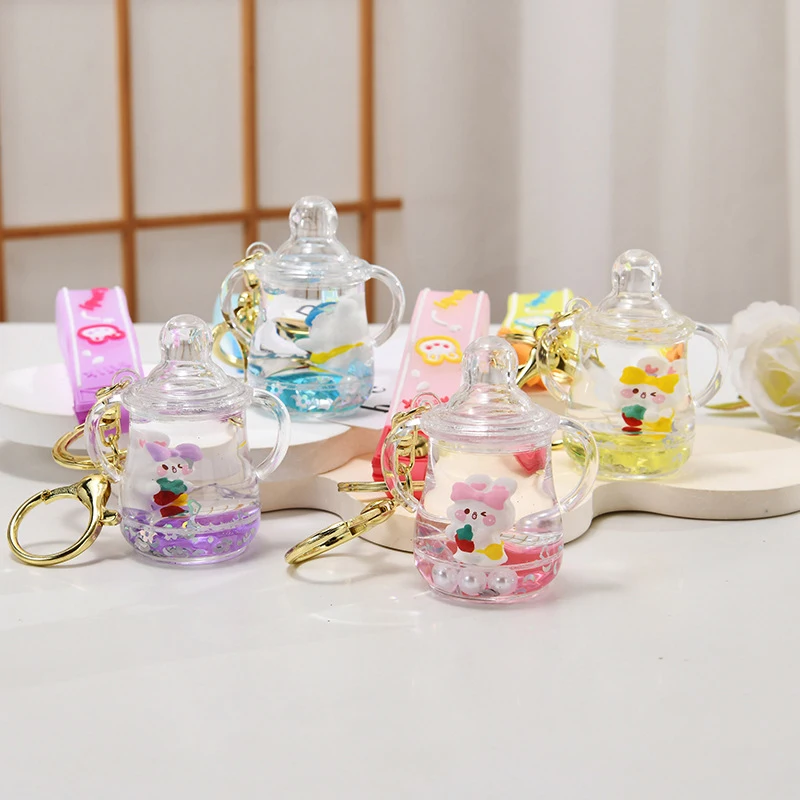 Porte-clés en acrylique de tasse de petit lapin en mouvement liquide, porte-clés de dessin animé mignon, porte-clés de sable mouvant d'huile, pendentif de clé de voiture de sac à dos, cadeau de fille