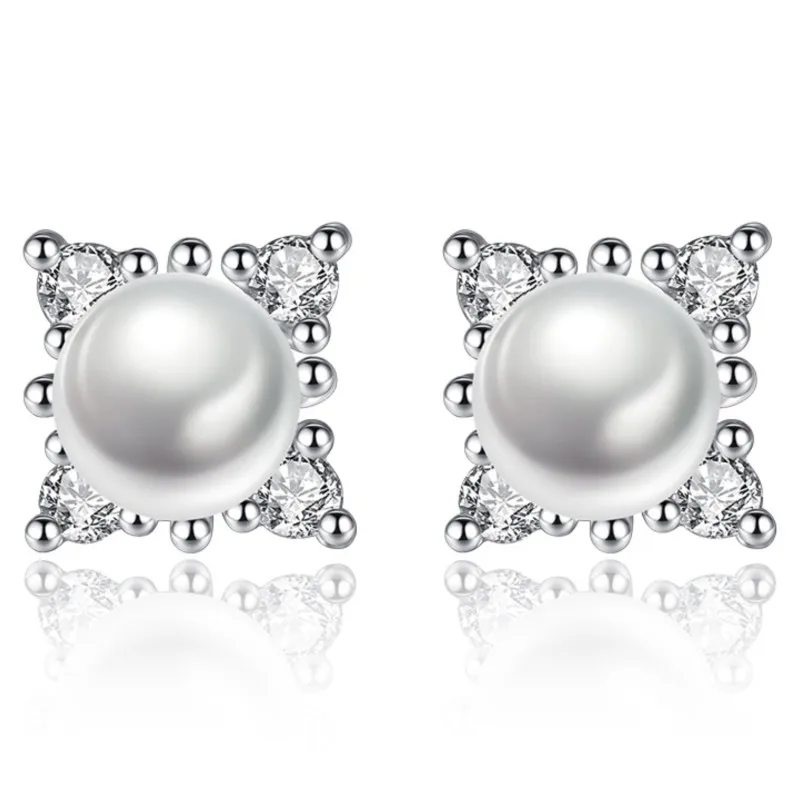 Regal Elegance: Silver Tone Cubic Zirconia and Imitation Pearl Stud Earrings for Women - A Sophisticated Blend of Classic